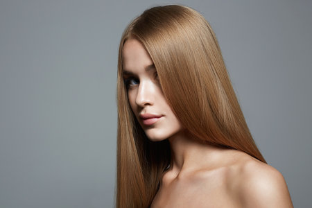 beautiful blond young woman. beauty portrait of pretty girl with Heathy hair. straight blonde hairstyleの写真素材