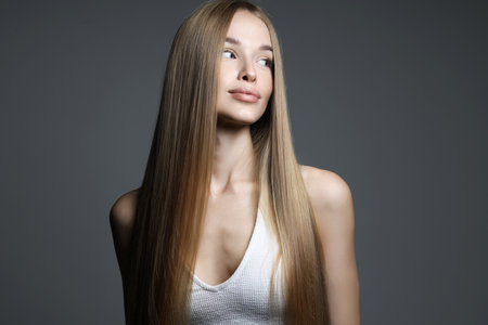 beautiful blond young woman. beauty portrait of pretty girl with long Hairの写真素材