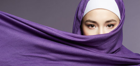 beautiful islamic young woman with Make-up. beauty girl in hijab. fashion oriental style model. Asianの写真素材