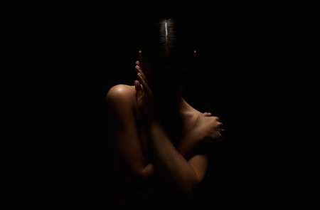 Nude Woman silhouette in the dark. Naked Body Girlの写真素材