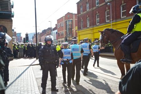 Sheffield, UK - June 8, 2013 - Police negotiators and liason officers at English Defence League and United Against Fascism protestのeditorial素材