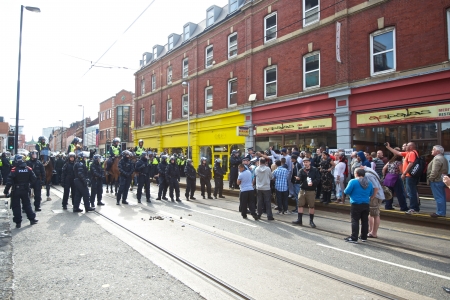 Sheffield, UK - June 8, 2013 - Riot police forming a blockade, English Defence League and United Against Fascism protestのeditorial素材