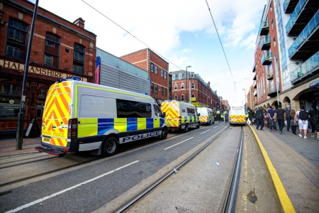 Sheffield, UK - June 8, 2013 - Police vans blocking the road, English Defence League and United Against Fascism protestのeditorial素材