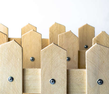 Home decoration: decorative wooden pet fence isolated on light backgroundの写真素材