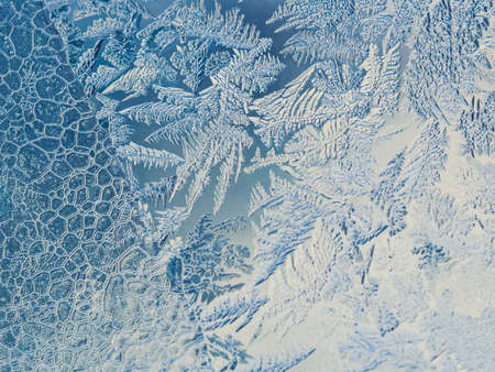 Winter Holidays Season Fantasy World Concept: Macro Image Of A Blue Frosty Window Glass Natural Ice...