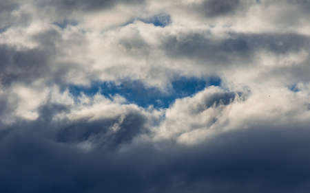 Dramatic sunset sky with colorful clouds after thunderstormの写真素材