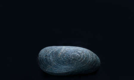 Chambray, Gray, Blue Rock on Dark Background. Spa, Cornerstone, Savings Concept.