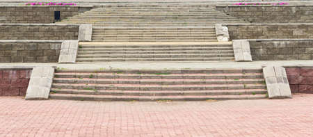 Modern Urban Architecture Details: Concrete Stairs, Cinder Block Walls and Paving Slabs with Purple...