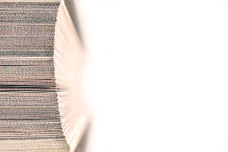 Top View of the Fore Edge, Closed Pages of a Bookmarked Hardcover Book Isolated On White Background....