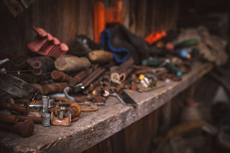 Perspective View of a Messy Wooden Shelf in a Garage Workshop. Keeping Your Workspace Clean and Tidy Concept.の写真素材