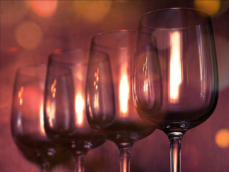 Catering, party concept: wine glasses on a wooden background. Selective focus.