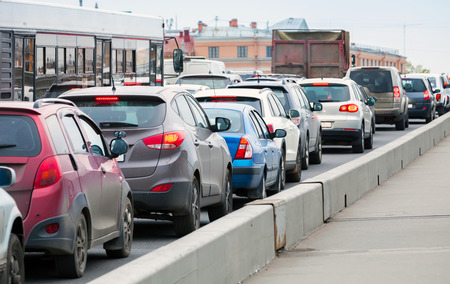Cars in a traffic jam on the big city street Cars in a traffic jam on the big city street