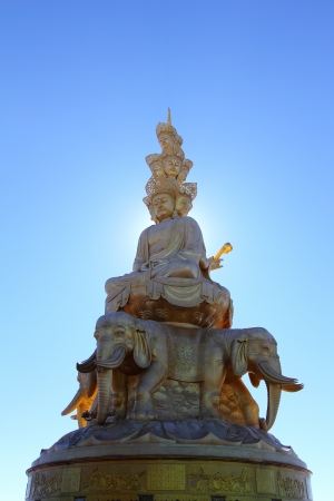 Samantabhadra statue backlit with sun on Mount Emeiの素材 [FY31016151618]