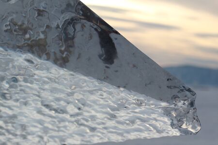 A close up of a transparent ice