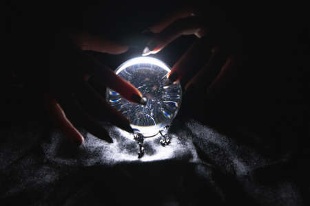 glowing magic ball and smoke in the darkの写真素材