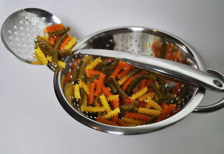 pasta in a colanderの写真素材