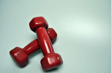 Sports equipment - 1 kg dumbbells and black ropeの写真素材