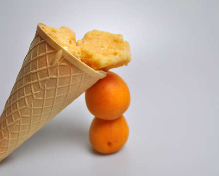 fresh fruit ice cream with apricots and cherriesの写真素材