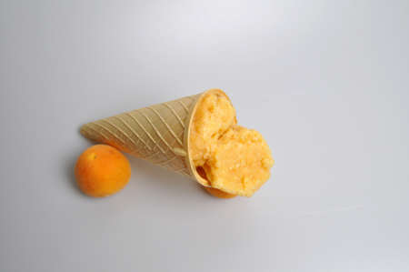 fresh fruit ice cream with apricots and cherriesの写真素材