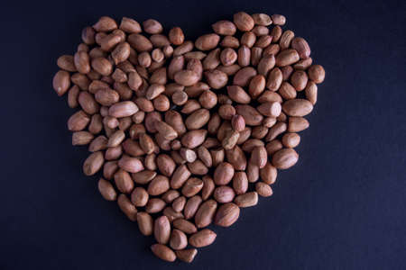Peanuts in the form of hearts on the table