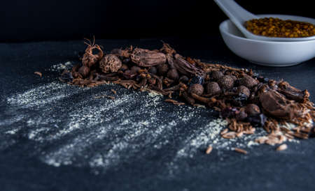 Spices on a table with mustardの写真素材