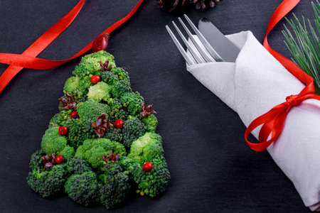 Vegetable and juicy green cabbage tree on the tableの写真素材