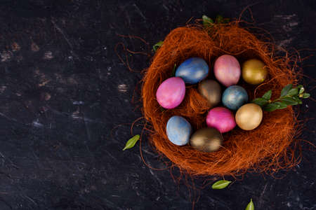 Quail eggs in rustic style on a dark background.
