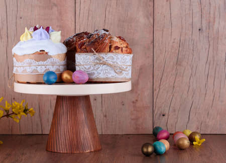 Delicious and beautiful Easter cakes on a stand and quail eggsの写真素材