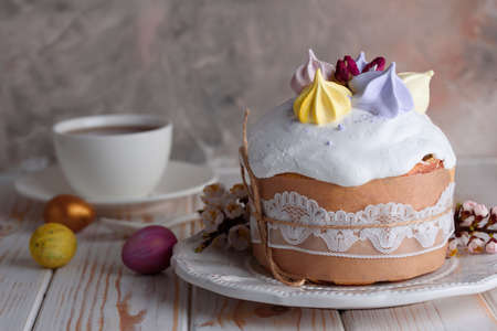 Delicious pastry baking. Easter cake with filling. Quail eggs. Flowers, table, dishes Beautiful dessertの写真素材