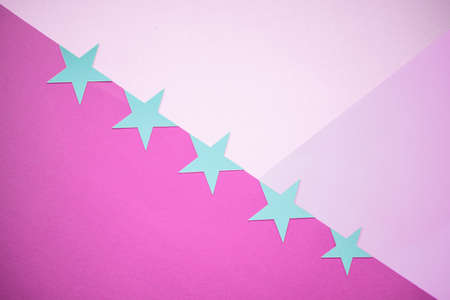 Beautiful background of various stars and sparkles, on colored background.の写真素材