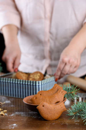Fragrant gingerbread cookies with nuts. The process of baking gingerbread. Holidays, new years,...