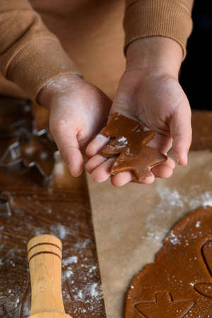 Fragrant gingerbread cookies with nuts. The process of baking gingerbread. Holidays, new years, chritsmasの写真素材