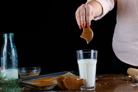 Fragrant gingerbread cookies with nuts. The process of baking gingerbread.の写真素材