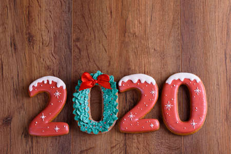 A cup of coffee with spices, gingerbread, spruce branches, gifts. Christmas. New Year 2020の写真素材