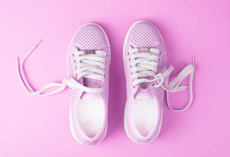 Sports shoes on a colorful background. View from above. Place for text. Flat layの写真素材