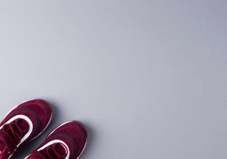 Sports shoes on a colorful background. View from above. Place for text. Flat layの写真素材