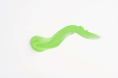 Beautiful brushstroke of green watercolor paint on a white background. Art concept