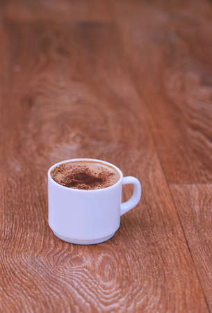 Coffee cup top view on old wooden. Place for textの写真素材