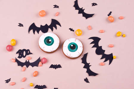 Halloween party content. Halloween gingerbread cookies on a wood background.の写真素材