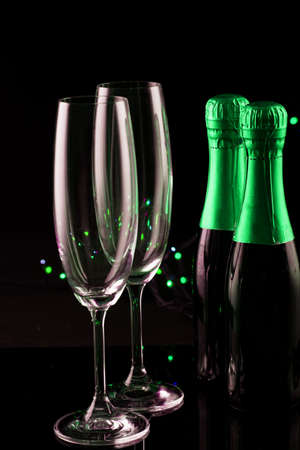 Two Glasses of Champagne against Blurred Christmas Lights. Shallow Depth of Field. New years 2020の写真素材