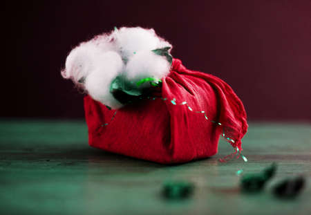 Christmas furoshiki wrapping. Etnical hristmas gift. Zero-waste christmas guide.の写真素材