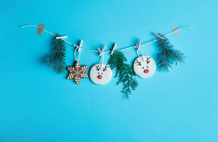 New Year's content 2020 numbers on red strings are half-hung, on a blue background. Zero wasteの写真素材