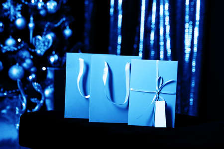 Beautiful festive red background with sparkles and Christmas golden toys. Holiday Content. New year 2020の写真素材