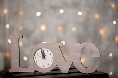 Content for Valentines Day. Clock in the form of the word love.