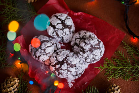 Beautiful tasty homemade cookie in the form of a muzzle of a deer on a wooden tray. Christmas foodの写真素材