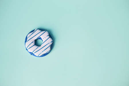 Big donut and Gingerbread donut on blue background birthday decoration. Partyの写真素材