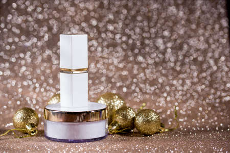 White lipstick on a glossy background. Cosmetics for lips. Glitterの写真素材