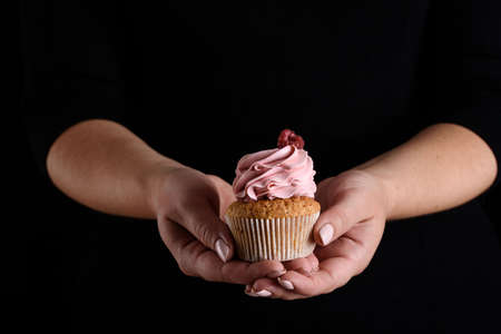 The process of making desserts. Cream cakes, muffins, cookies, groceries. The kitchen and confectioner makes desserts. Sweets.の写真素材