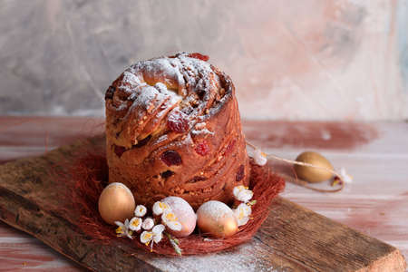 Delicious pastry baking. Easter cake with filling. Quail eggs. Flowers, table, dishes.