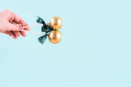 Delicious and beautiful cake pops on an abstract background.